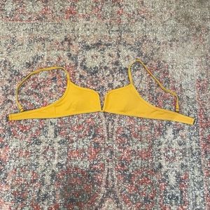 mustard bikini top with v-cut